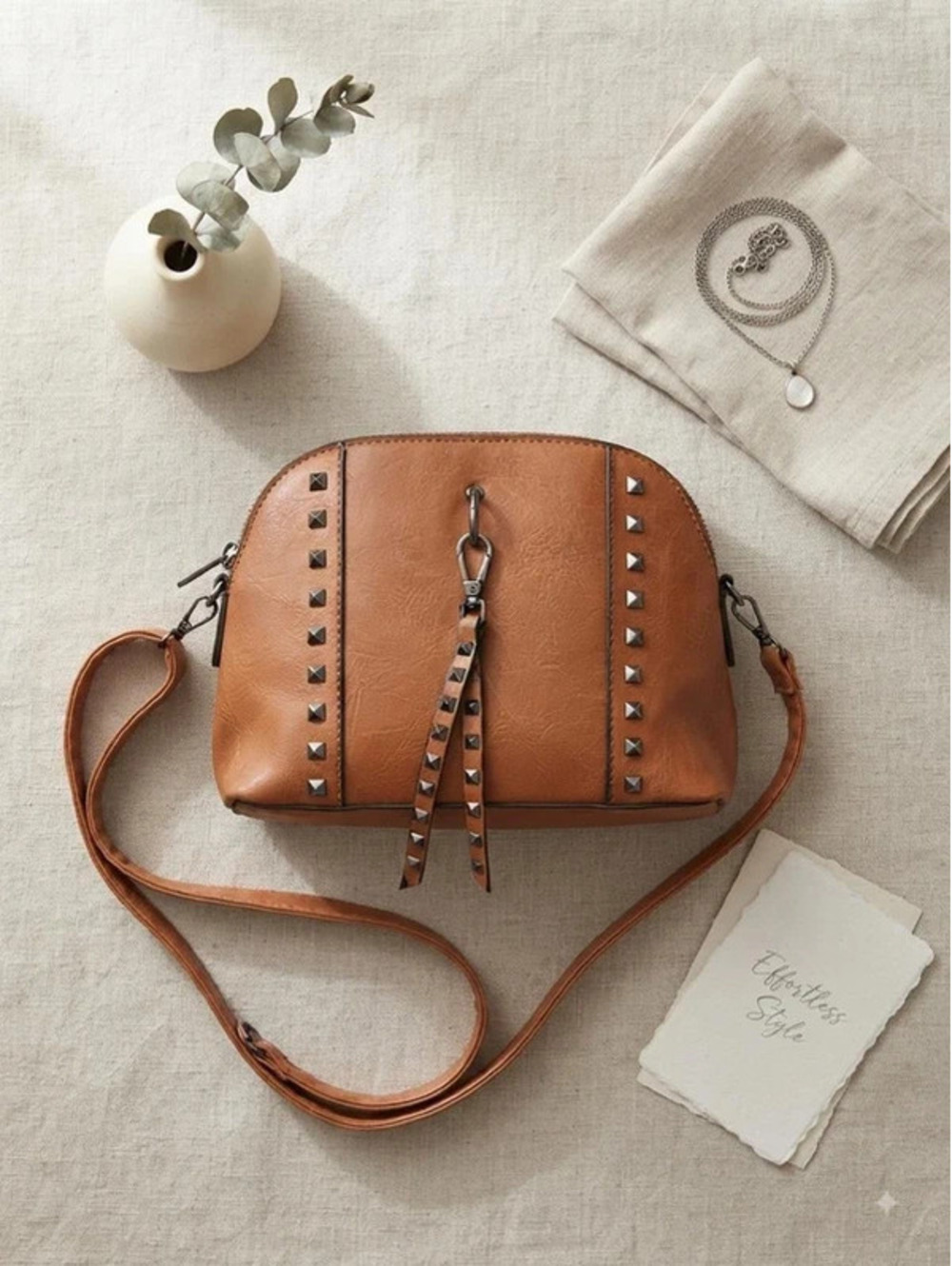 Sam & Hadley brown faux-leather crossbody bag.